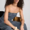 Paula Echevarría bandeau-top i gingham med flæser