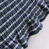 Paula Echevarría bandeau-top i gingham med flæser