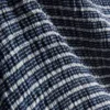 Paula Echevarría bandeau-top i gingham med flæser