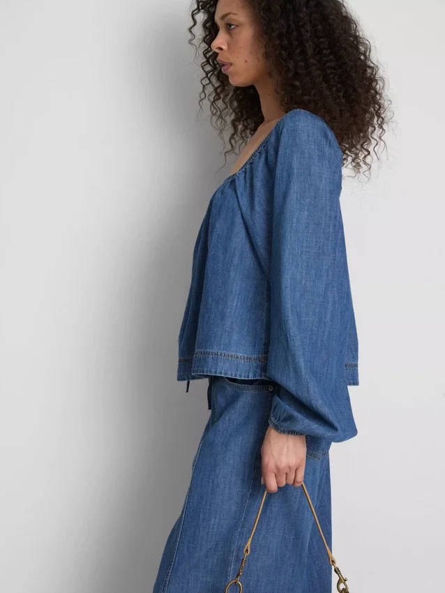 Paula Echevarría denim-top med pufærmer