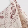 Paula Echevarría lang cami-top i krøllet satin
