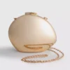 Paula Echevarría metallisk oval skuldertaske