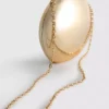 Paula Echevarría metallisk oval skuldertaske