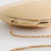 Paula Echevarría metallisk oval skuldertaske