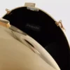 Paula Echevarría metallisk oval skuldertaske