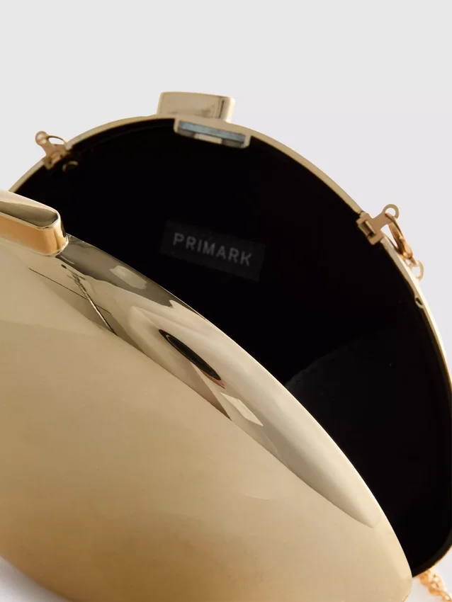 Paula Echevarría metallisk oval skuldertaske
