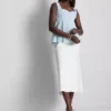 Peplum-top i crepe med hjerteudskæring