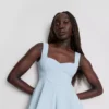Peplum-top i crepe med hjerteudskæring