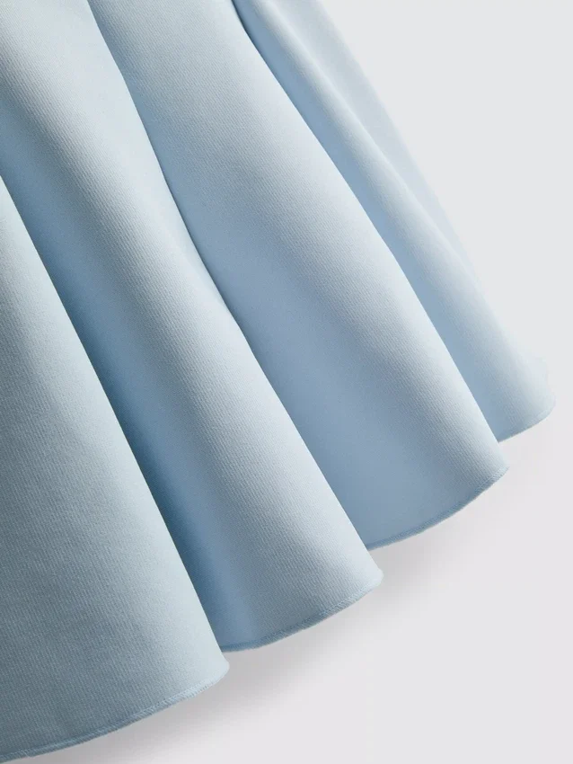 Peplum-top i crepe med hjerteudskæring
