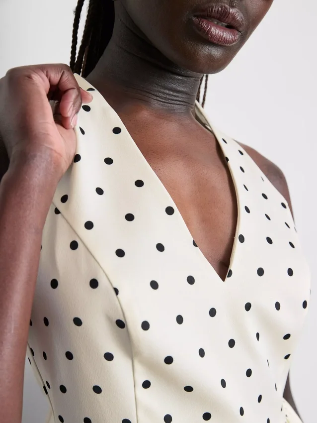 Peplum-top med halterneck og prikker