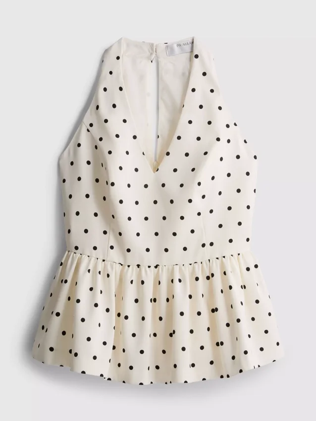 Peplum-top med halterneck og prikker