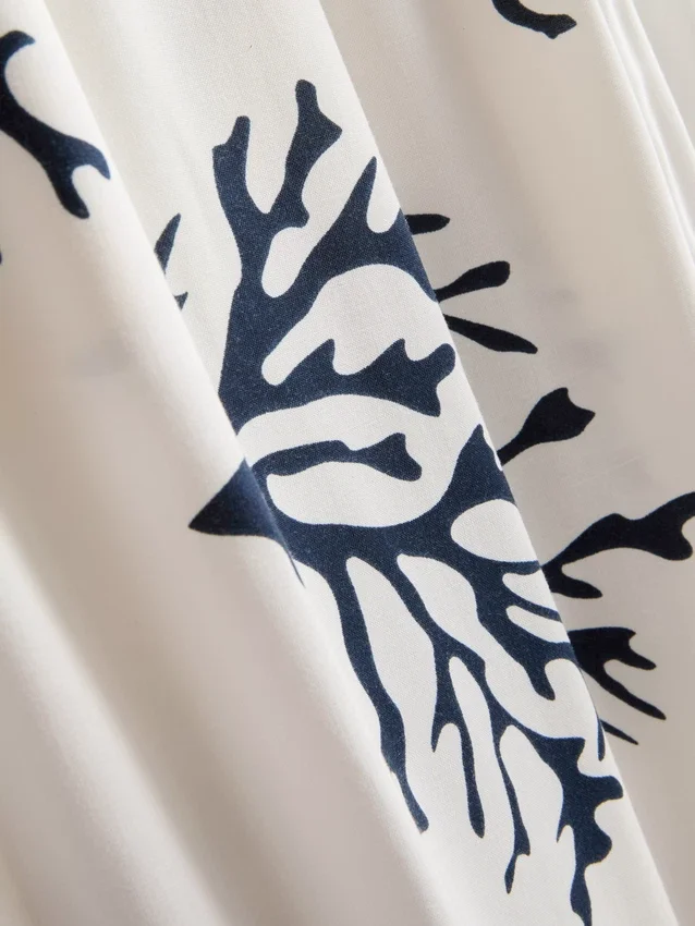 Pyjamasbukser med brede ben og koralprint