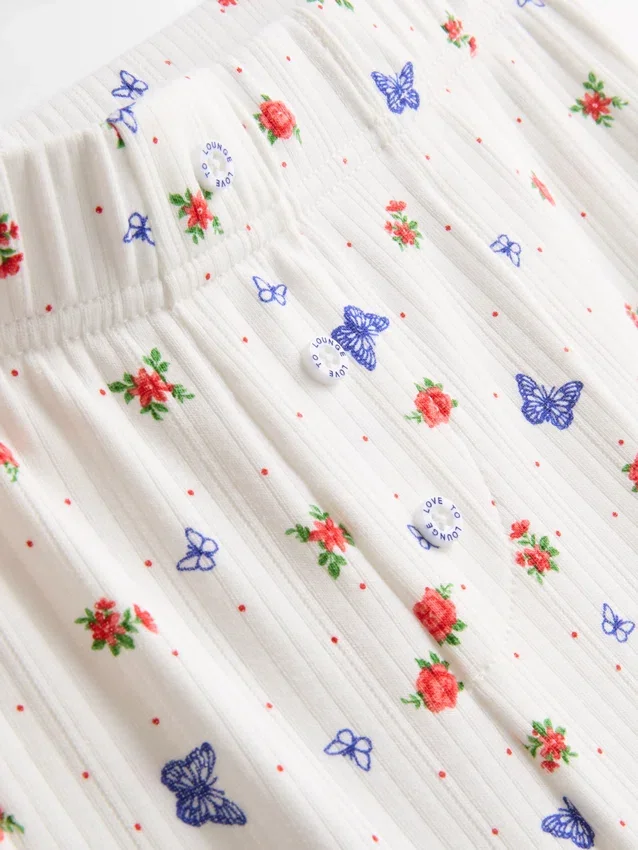 Ribbede pyjamasbukser med sommerfuglemotiv