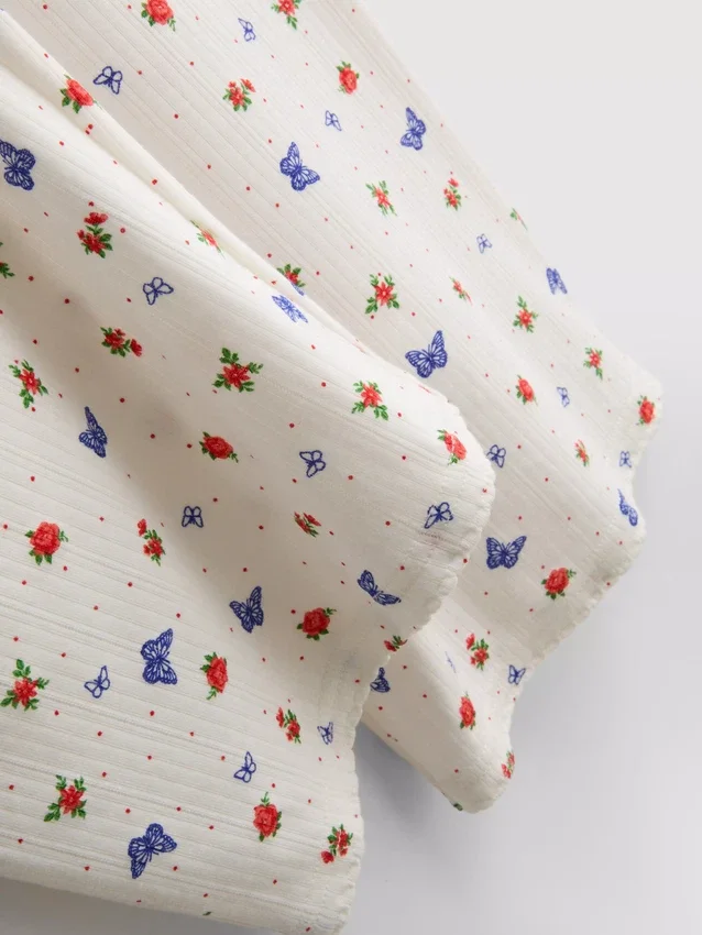 Ribbede pyjamasbukser med sommerfuglemotiv