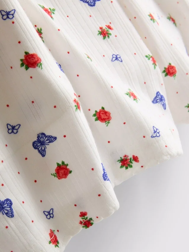 Ribbede pyjamasser med sommerfuglemotiv