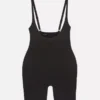 Shapewear-bodysuit med åben brystdel og længde til midt på låret