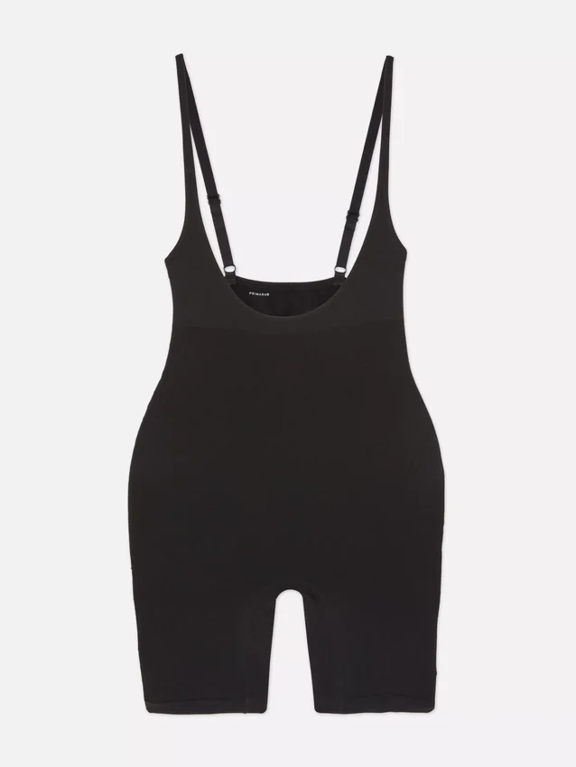 Shapewear-bodysuit med åben brystdel og længde til midt på låret