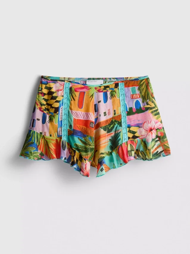 Shorts med flæser og tropisk print