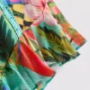 Shorts med flæser og tropisk print