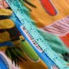 Shorts med flæser og tropisk print