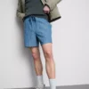 Shorts med struktur og snøre i taljen