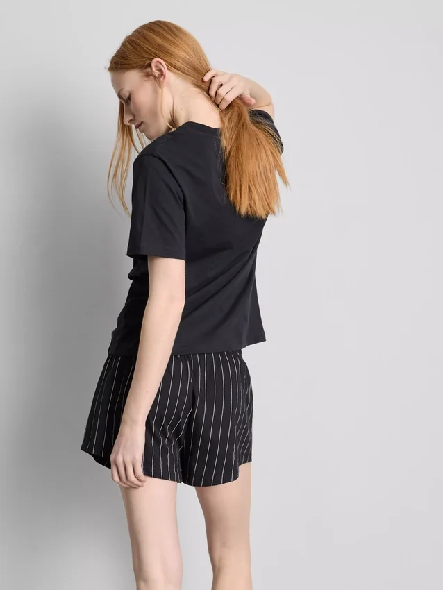 Shorty-pyjamasser med sloganet »The Devil Wears Prada«