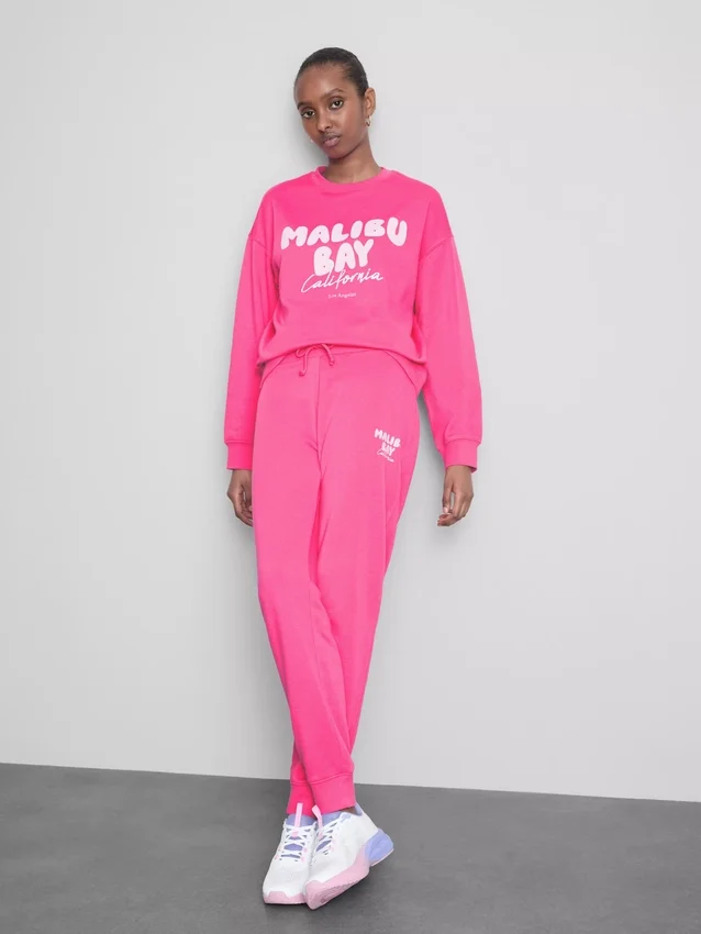 Skinny joggingbukser i bomuldsblanding med print