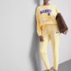 Skinny joggingbukser i bomuldsblanding med print