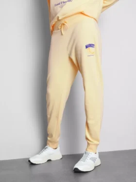 Skinny joggingbukser i bomuldsblanding med print
