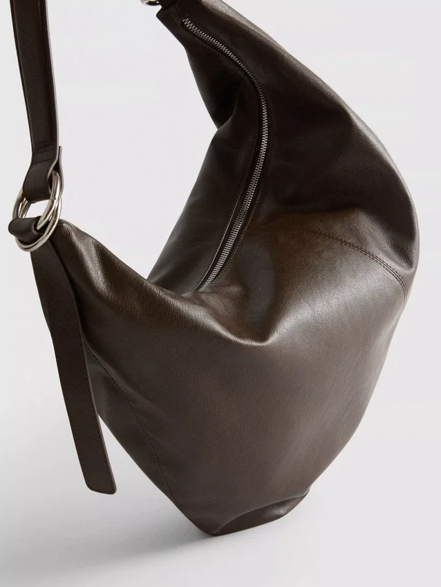 Skuldertaske med ringdetaljer