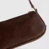 Skuldertaske med spænde og lomme