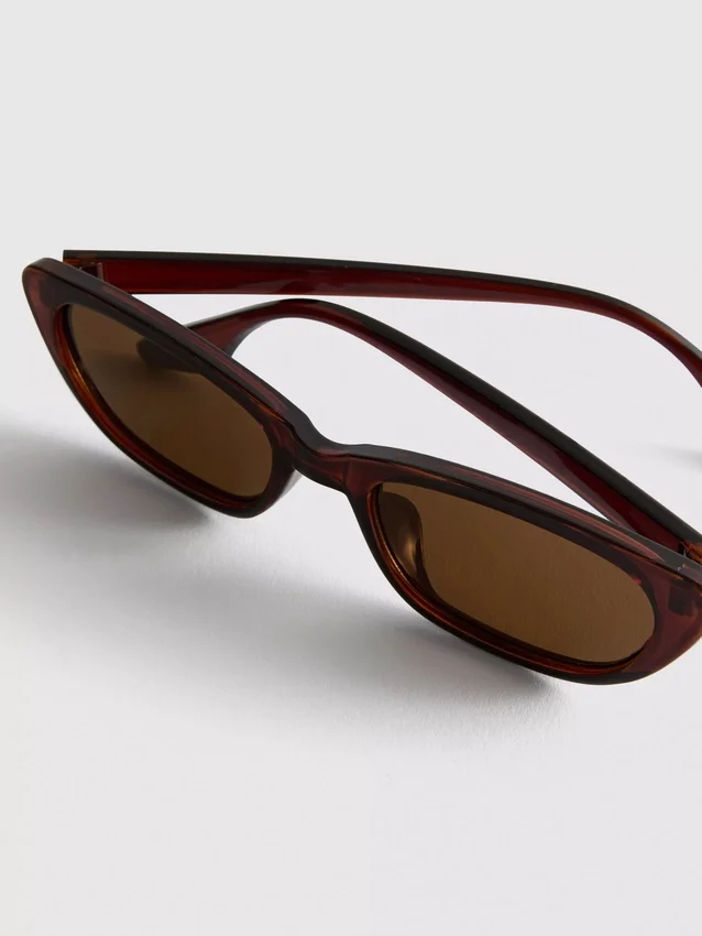 Slanke solbriller i cat-eye-stil