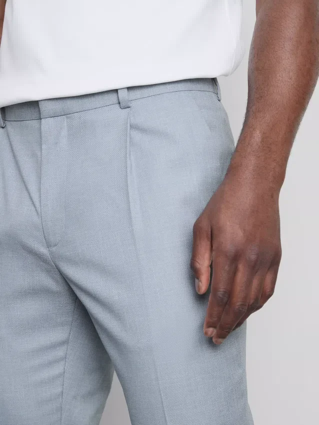 Slim fit-bukser med dobby-struktur