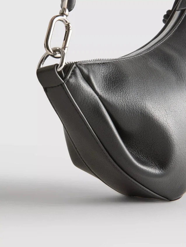 Sling-crossbody-taske i imiteret læder