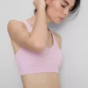 Sømløs aktiv crop-top med krydsede stropper på ryggen