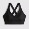 Sømløs aktiv crop-top med krydsede stropper på ryggen