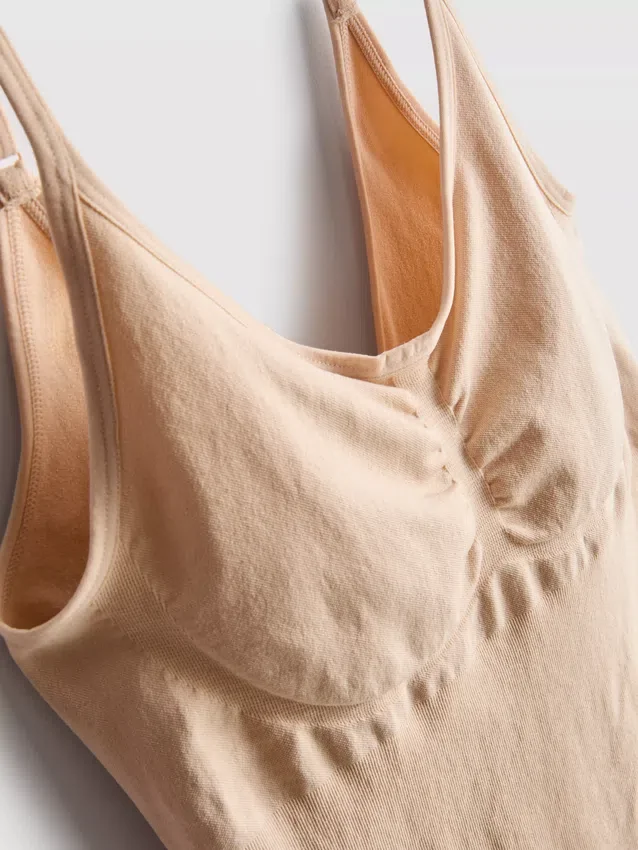 Sømløs, figurformende bodysuit