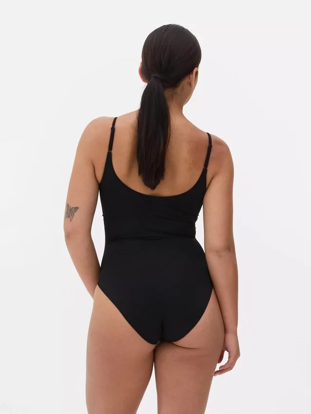 Sømløs, figurformende bodysuit