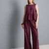 Stribet tanktop med peplum-kant