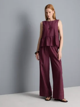 Stribet tanktop med peplum-kant