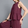 Stribet tanktop med peplum-kant