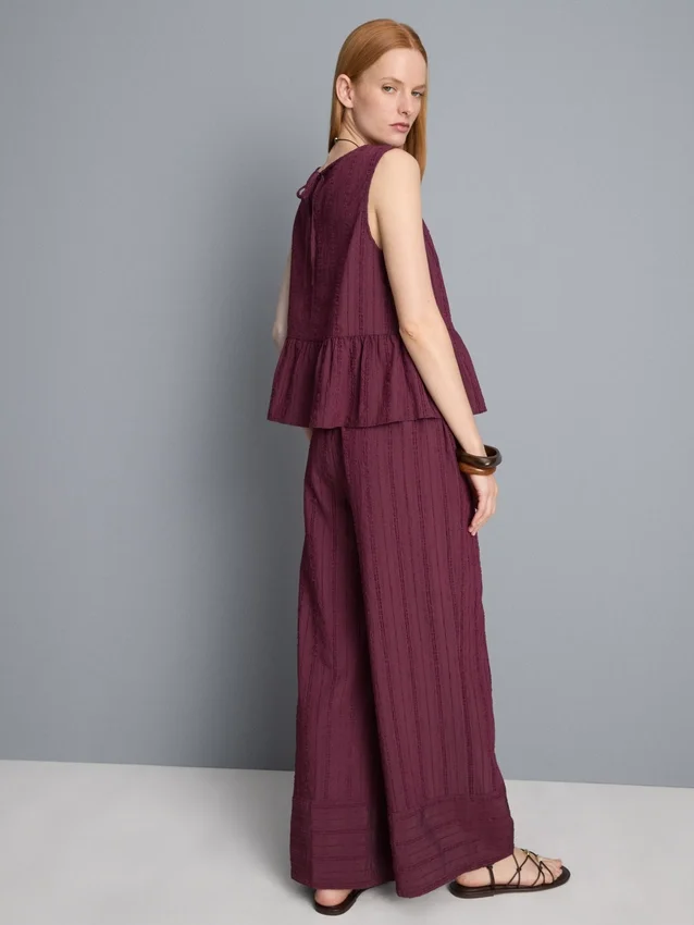 Stribet tanktop med peplum-kant