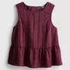 Stribet tanktop med peplum-kant