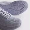 Strikkede sneakers med snørebånd