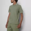 Strikket poloshirt med struktur og lynlås i halsen