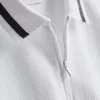 Strikket poloshirt med struktur og lynlås i halsen