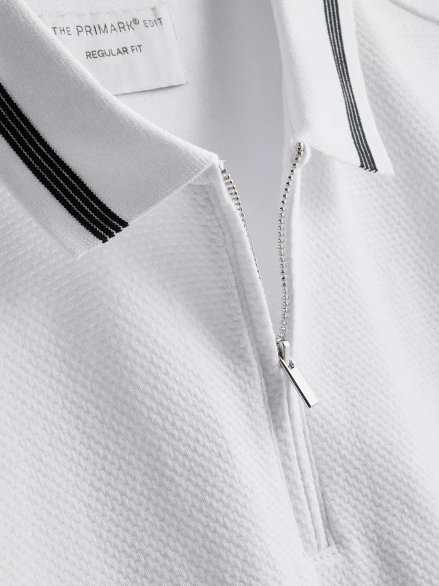 Strikket poloshirt med struktur og lynlås i halsen