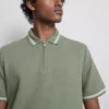 Strikket poloshirt med struktur og lynlås i halsen