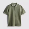 Strikket poloshirt med struktur og lynlås i halsen