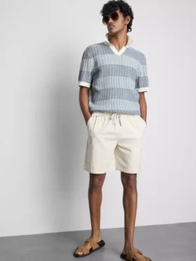 Strikket poloshirt med strukturerede striber